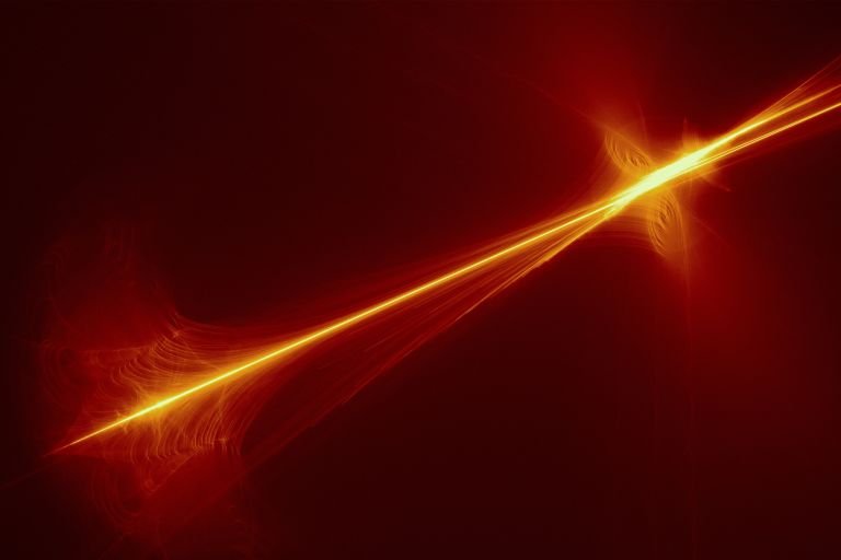 Лазерный луч на темно-красном  фоне